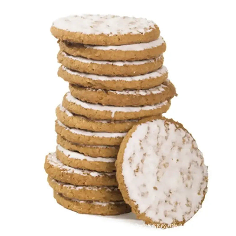 Stack of golden-brown cookies dusted with powdered sugar next to a red silicone dough press cutter for baking use