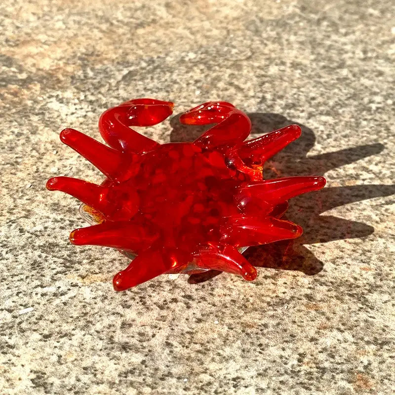 Vibrant red speckled decorbites crab glass figurine with glossy translucent finish and detailed limbs for living room art decor