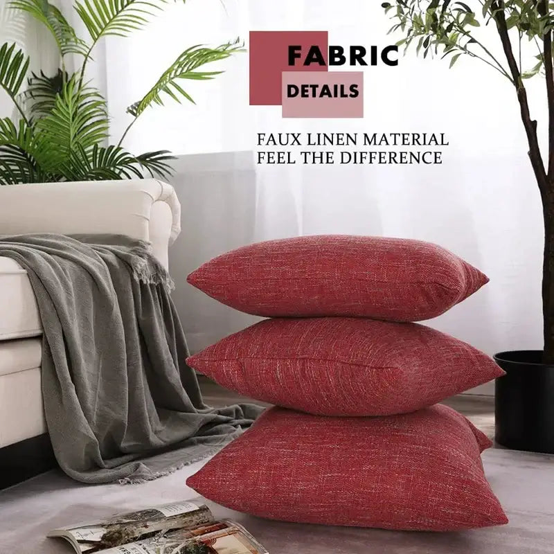 Stack of three red faux linen throw pillows showcasing decorbites linen throw pillow covers for living room decor