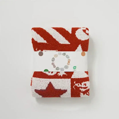 A cozy red and white dragon zodiac decorbites knitted blanket throws with plush textured surface for bedroom decor