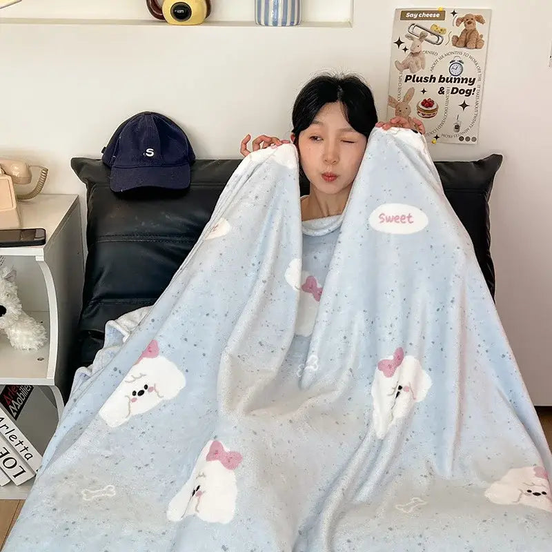 Light blue velvet printed blanket featuring white cartoon bunnies with pink bows for bedroom decor
