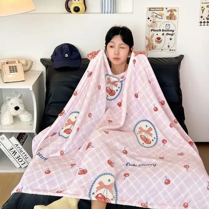 Pink cherry-patterned velvet printed blanket with soft cozy texture and subtle grid design for bedroom decor