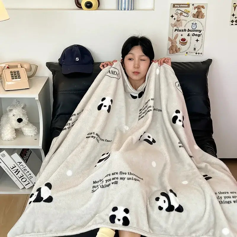 Soft cream-colored velvet printed blanket with black panda faces and text phrases for bedroom decor