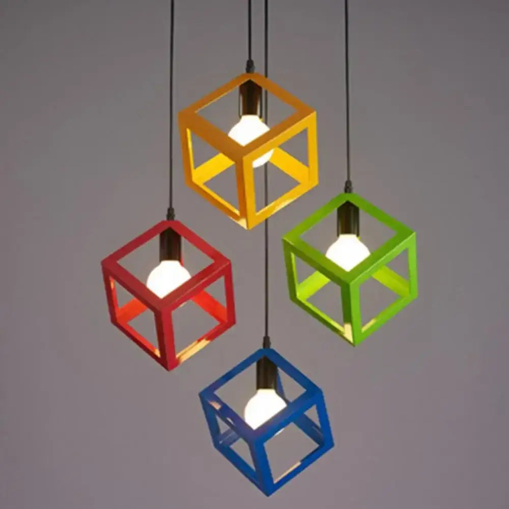 Four colorful cube-shaped pendant lights in yellow red green and blue with exposed bulbs for decorbites elegant square chandelier