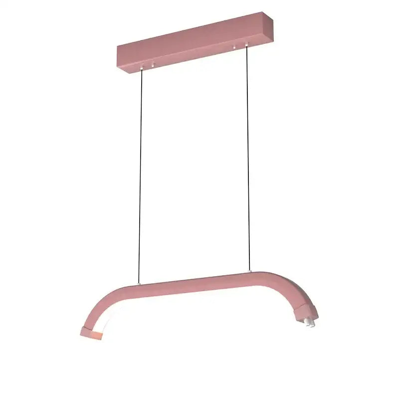 Refined modern led pendant light with a soft pink curved design ideal for beauty studio lighting
