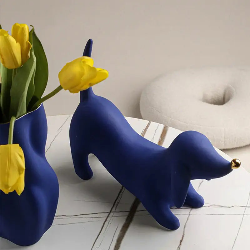 Blue ceramic dachshund figurine with gold nose and tail tip as a decorbites doberman art statue for home decor
