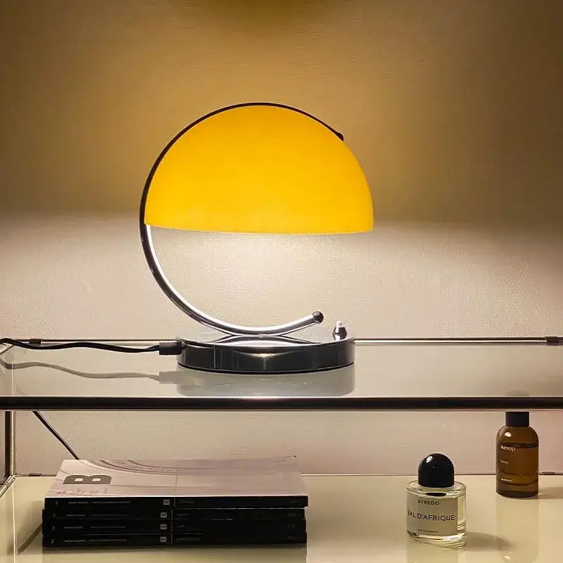 Retro amber decorbites glass table lamp with vibrant yellow semi-spherical shade and polished chrome base for bedroom decor