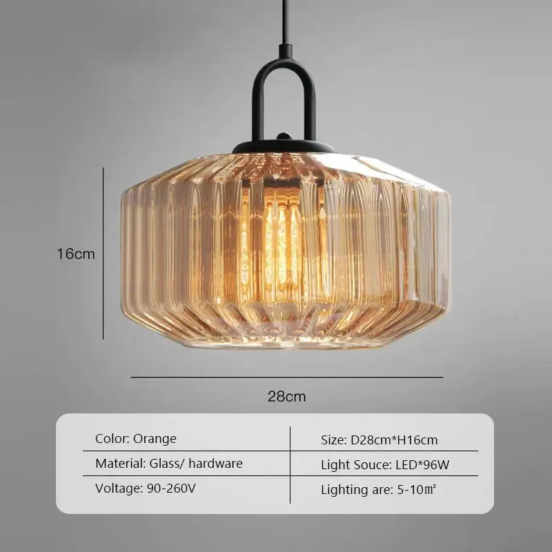Orange glass pendant dining chandelier with ribbed faceted design and black metal hardware for color glass dining decorbites