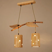 Natural wood retro bamboo art chandelier with two cylindrical slat lanterns suspended by ropes for dining room lighting