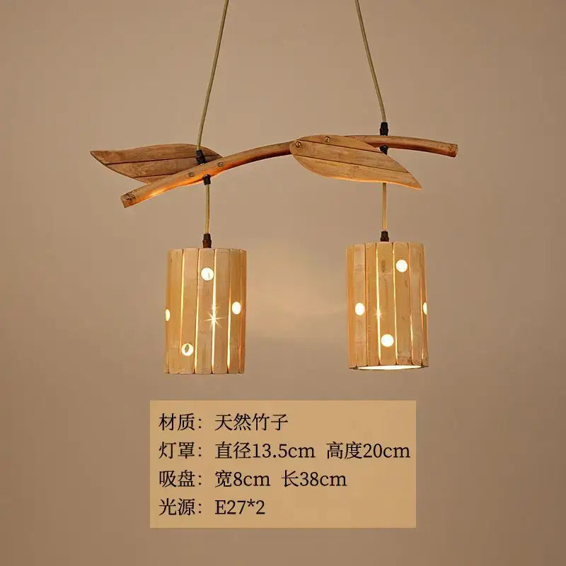 Natural bamboo art chandelier with two cylindrical shades and leaf-shaped accents for dining room lighting