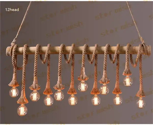 Rustic wooden beam pendant lights with twelve hanging edison bulbs suspended by natural bamboo hemp rope decorbites