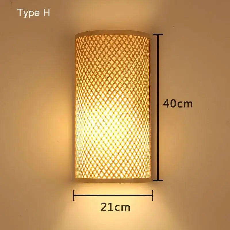 A warm-toned retro bamboo wall light with woven lattice design in rattan measuring 40cm by 21cm