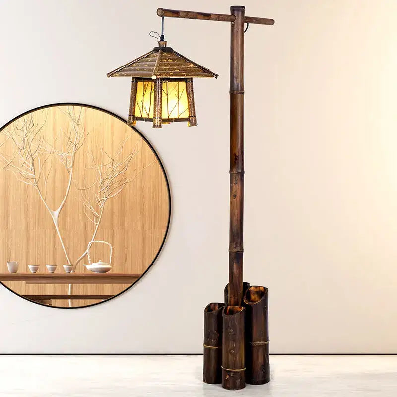A rustic retro bamboo weave floor lamp with a traditional pagoda-style lantern emitting warm light for zen living room