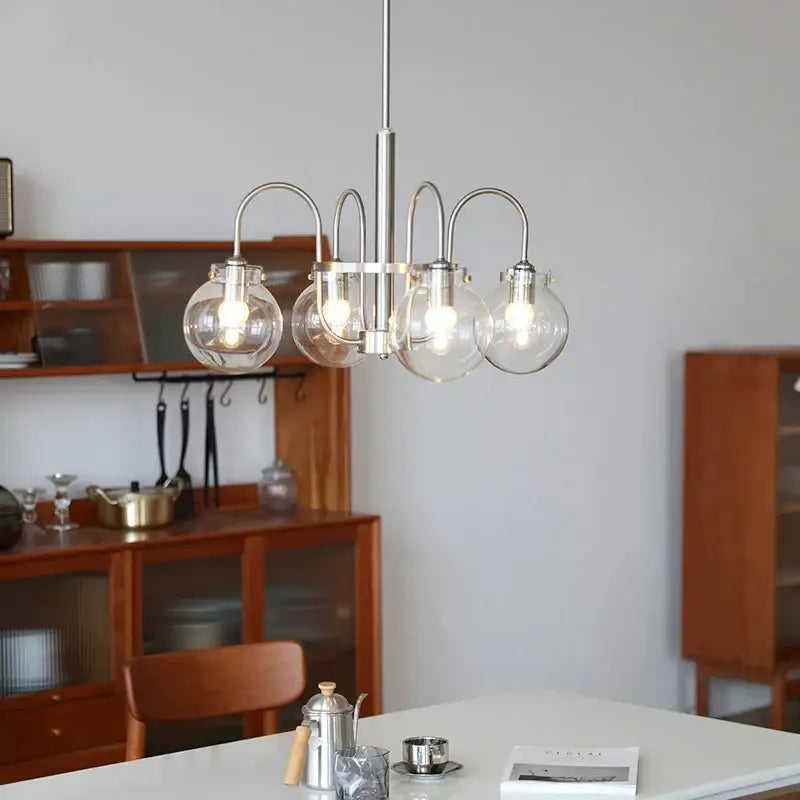 Modern brushed stainless steel glass led chandelier with five clear globe shades for dining room lighting