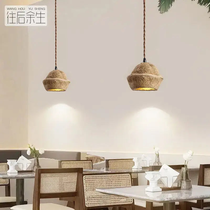 Retro beige cork fruit shell bedside pendant light with natural fiber woven texture and warm golden interior glow