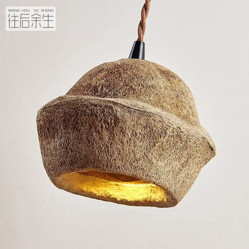 Rustic brown textured pendant light with warm golden glow decorbites fruit shell bedside light for bedroom decor