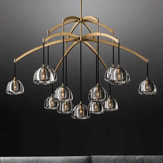 Gold-toned decorbites black brass retro chandelier with clear glass pendant shades and exposed filament bulbs for dining room decor
