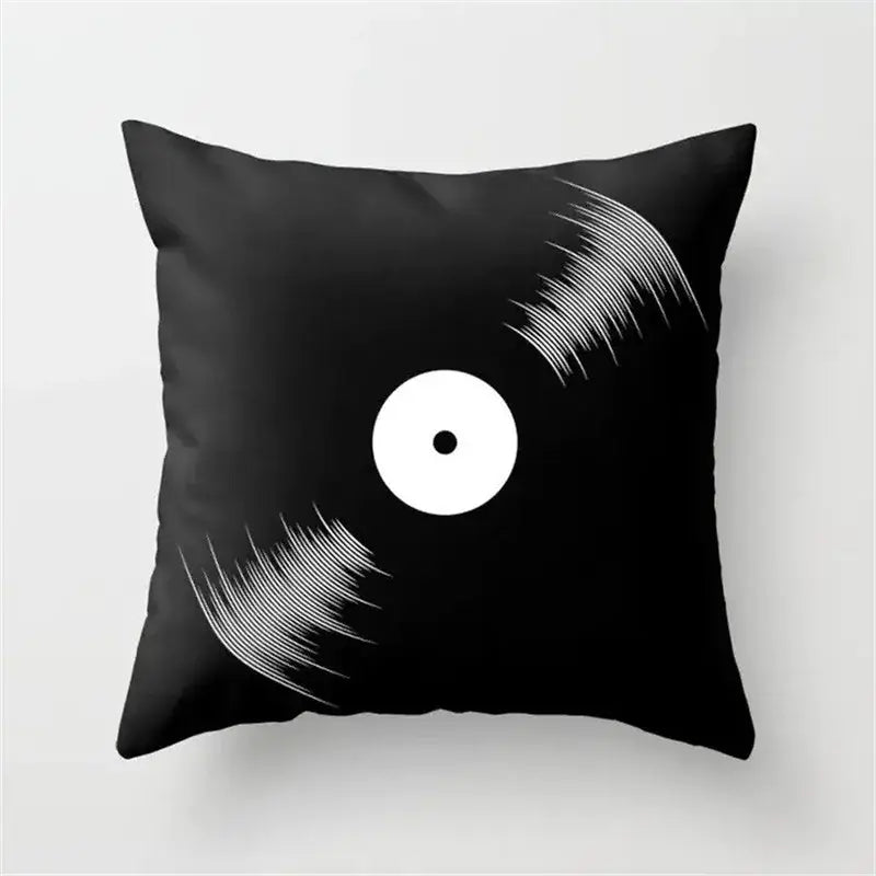 Black throw pillow cushion cover featuring a stylized white vinyl record design for retro living room decor with black camera print