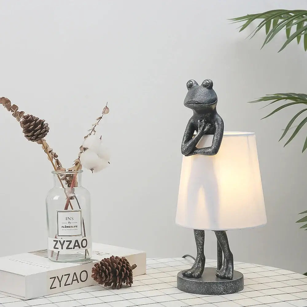Black metallic frog resin desk lamp with white fabric shade suitable for bedroom decorbites frog resin lighting