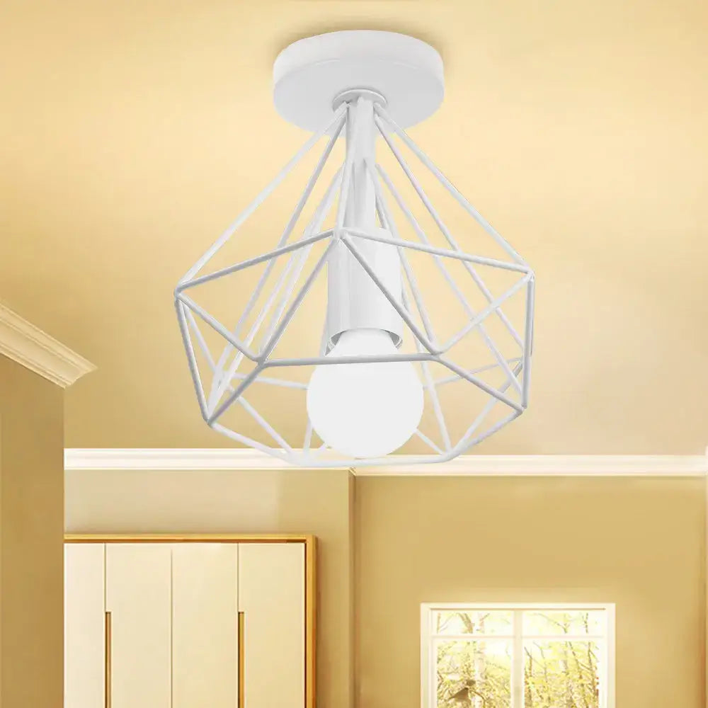 White geometric metal ceiling light fixture with wireframe design and frosted bulb inside for kitchen use