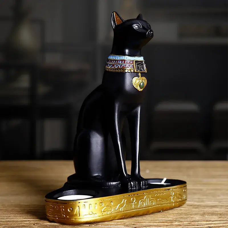 Black resin cat goddess candle holder with gold accents and hieroglyphic base for retro living room decor