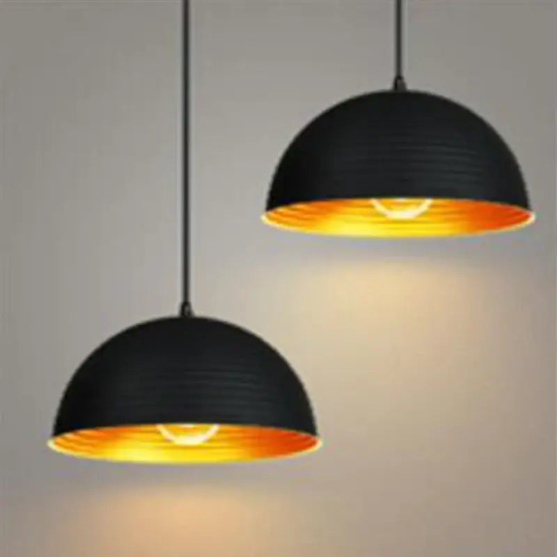 Retro black and gold semicircle pendant light with textured exterior and warm gold interior lining for dining room decorbites black pot cover