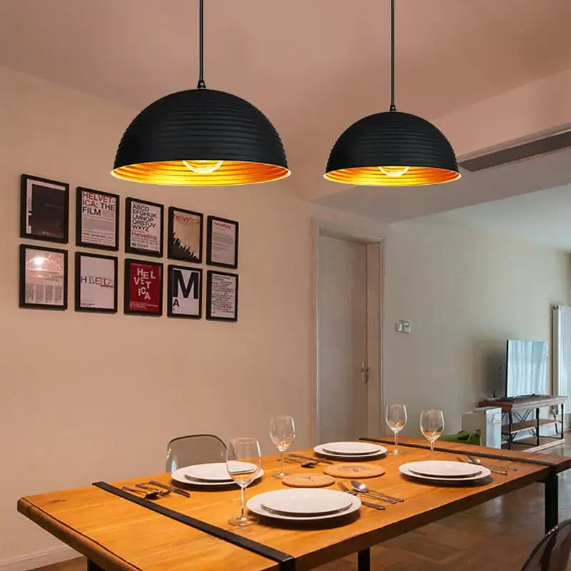 Retro black and gold semicircle pendant light with ribbed design and warm gold interior glow for dining room decorbites black pot cover