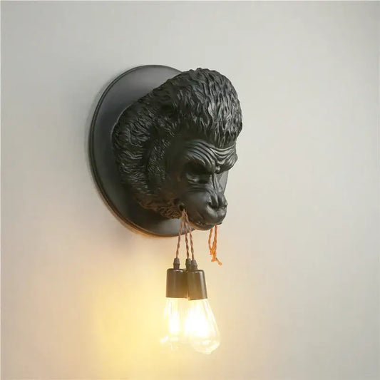 Retro black gorilla resin wall sconce with dual filament bulbs hanging from mouth for bedroom decorbites gorilla resin wall