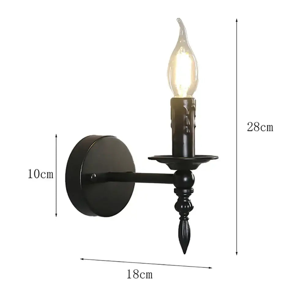 Retro black iron art wall lamp featuring a black wrought iron candle sconce with frosted glass bulb decorbites iron art