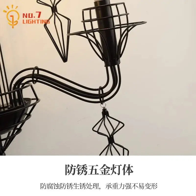 Retro black iron candle wall lamp featuring a geometric wireframe wrought iron chandelier design for living rooms