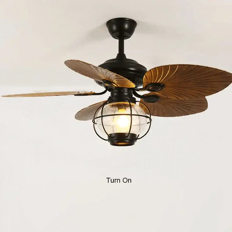 Retro black iron fan light with wooden leaf blades and globe light fixture featuring remote control for living room use