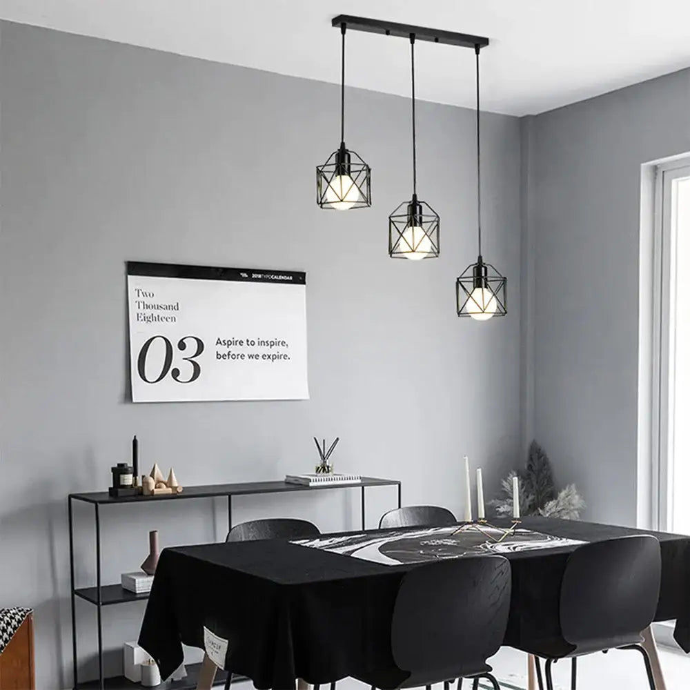 Retro black geometric pendant light with iron frame and exposed bulbs by DecorBites for kitchen decor