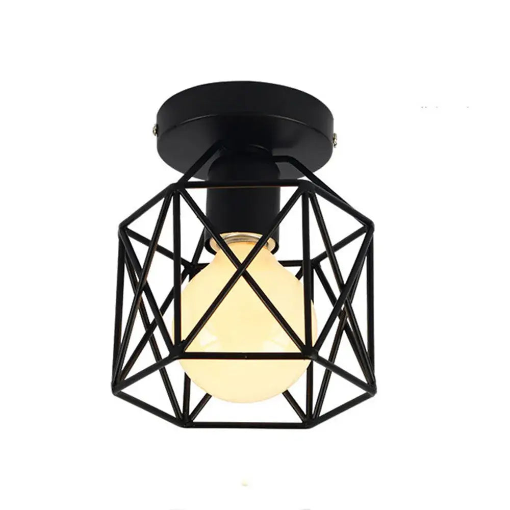 Retro black iron frame pendant light with geometric cage design and warm bulb for kitchen decorbites iron frame