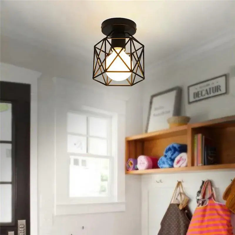 Black metal geometric pendant light with warm glow iron frame decorbites iron frame perfect for kitchen decor