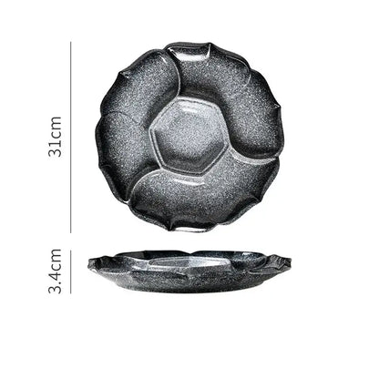 Retro black speckled decorbites ceramic dinner plate with petal rim and hexagonal center indentation for serving