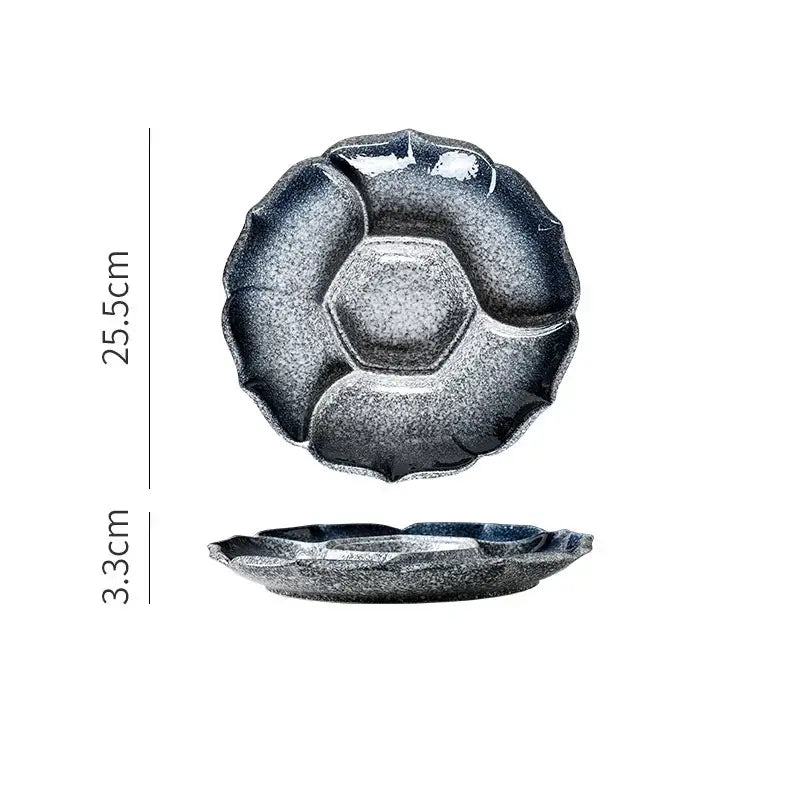 A dark gray speckled ceramic dinner plate with a petal rim and hexagonal center from decorbites ceramic 4-grid collection