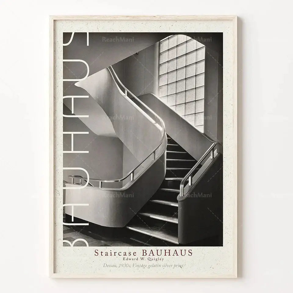 A framed black and white bauhaus stairs canvas print with bold typography in a textured off-white frame for living room wall art