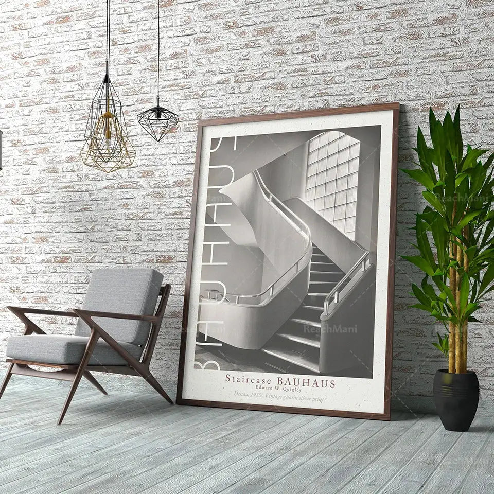 A framed black and white bauhaus stairs canvas print featuring bold vertical lettering for living room wall art