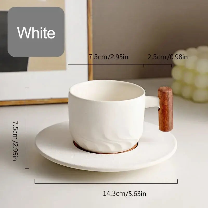 White ceramic coffee cup with textured surface and wooden handle served on matching saucer from decorbites 130ml blue set