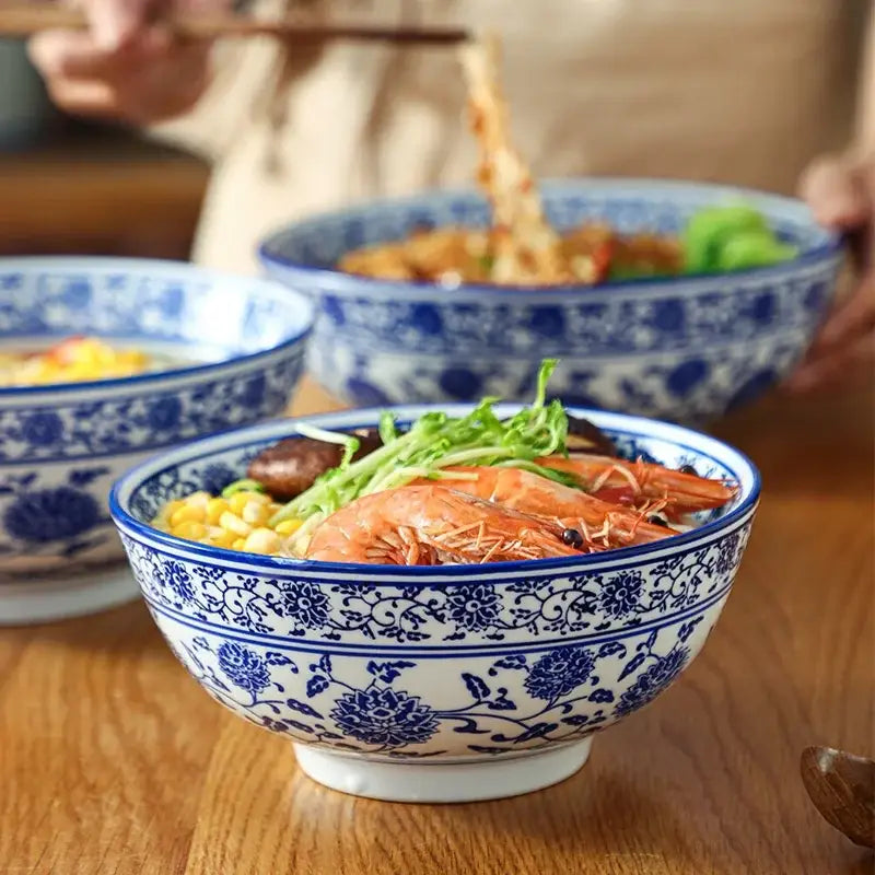 Blue and white retro ceramic soup noodle bowl with intricate floral patterns for dining room use