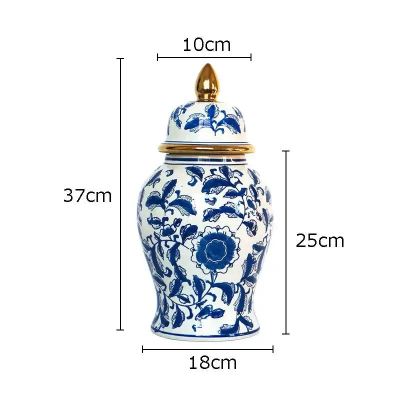 Retro blue and white porcelain ginger jar with intricate floral patterns and gold tipped lid for living room decorbites decor