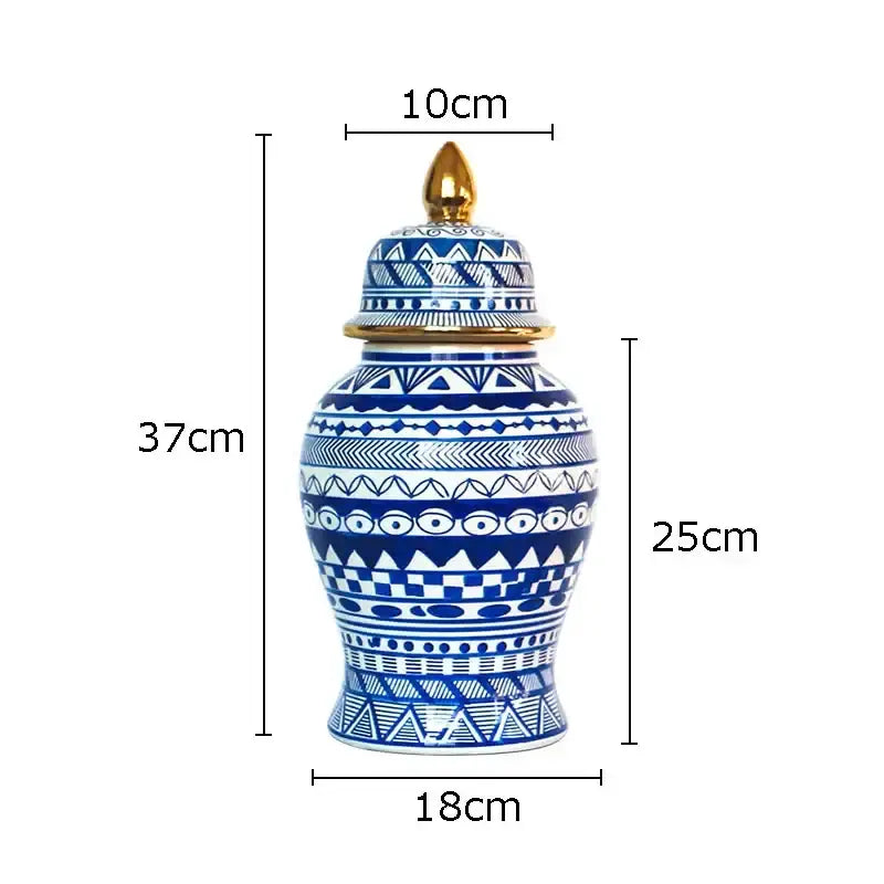 A tall 37cm white porcelain ginger jar with blue geometric patterns and a gold-toned lid from decorbites blue
