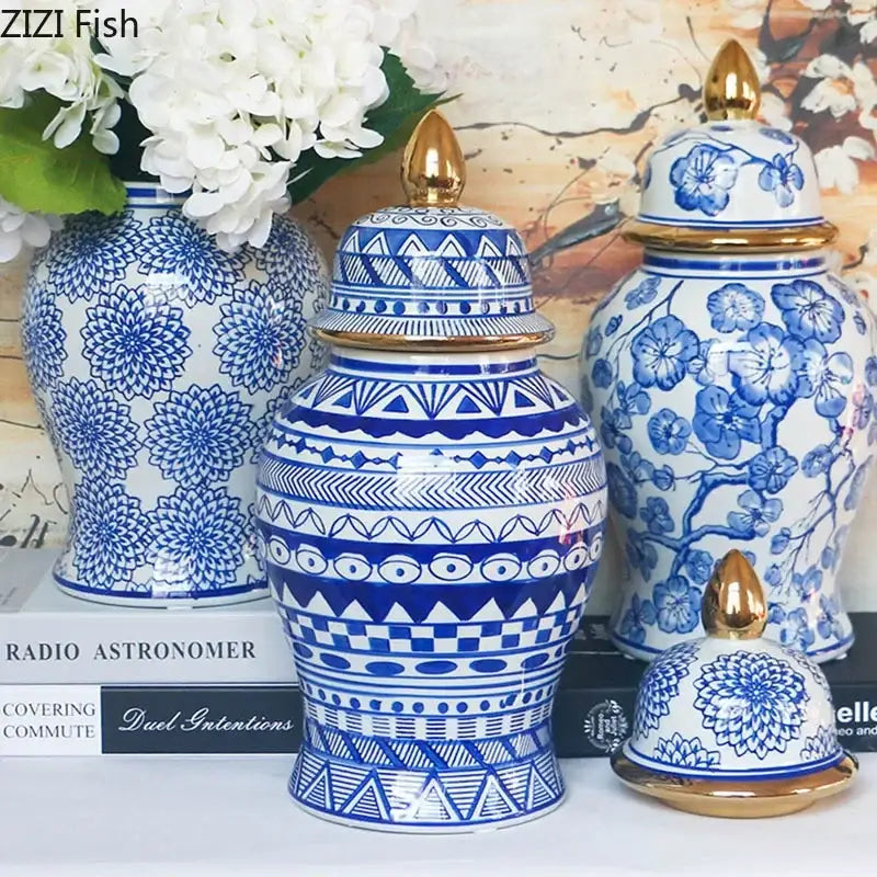 Retro blue and white porcelain ginger jar with gold tipped lids featuring intricate geometric and floral patterns