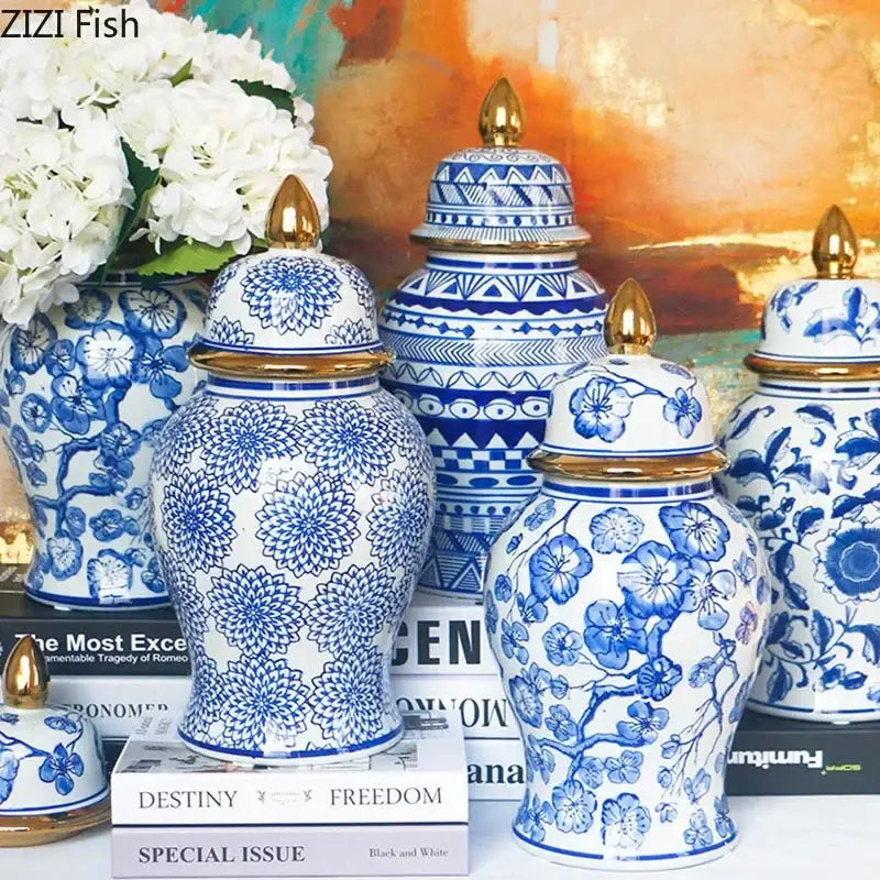 Retro blue and white porcelain ginger jars with gold tipped lids featuring intricate floral and geometric patterns decorbites blue