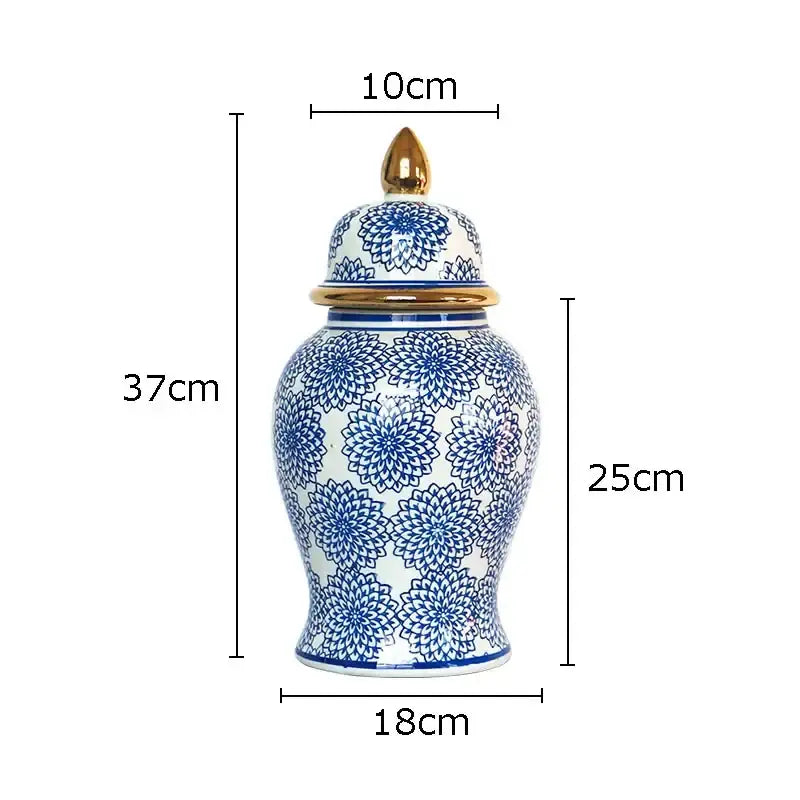 Tall elegant retro blue and white porcelain ginger jar with gold toned lid and finial decorbites blue porcelain ginger jar