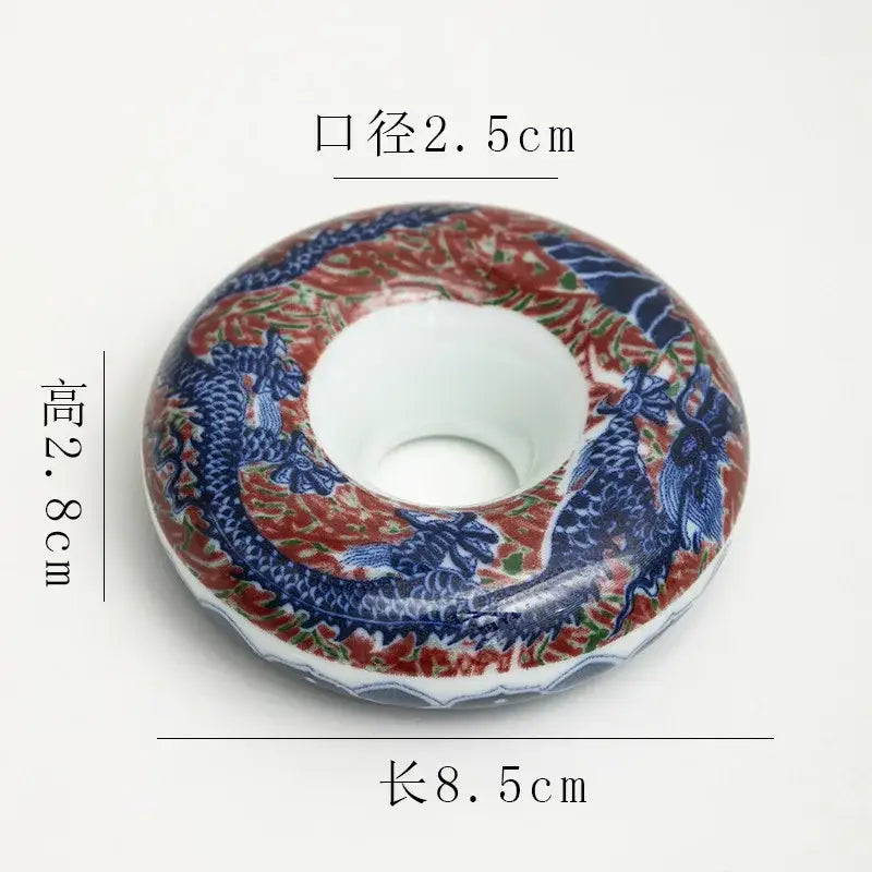 A ceramic retro blue and white porcelain teacup tray set with glossy finish and intricate dragon motifs