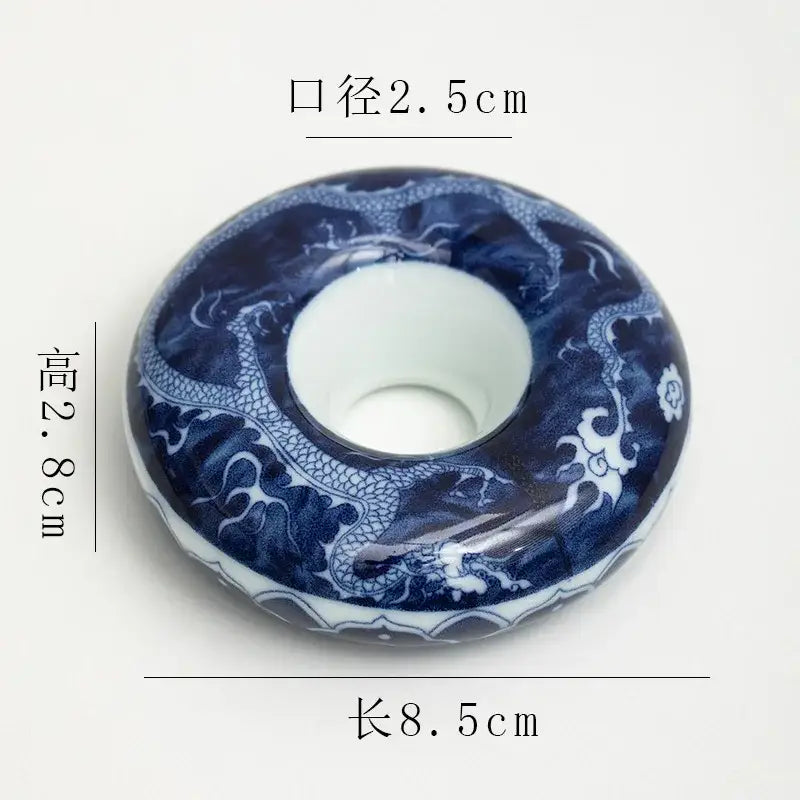 Retro blue and white porcelain teacup tray set featuring a ceramic ring-shaped incense burner with intricate dragon designs