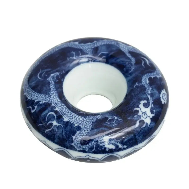 Retro blue and white porcelain teacup tray set with a ceramic donut-shaped incense burner featuring intricate dragon designs
