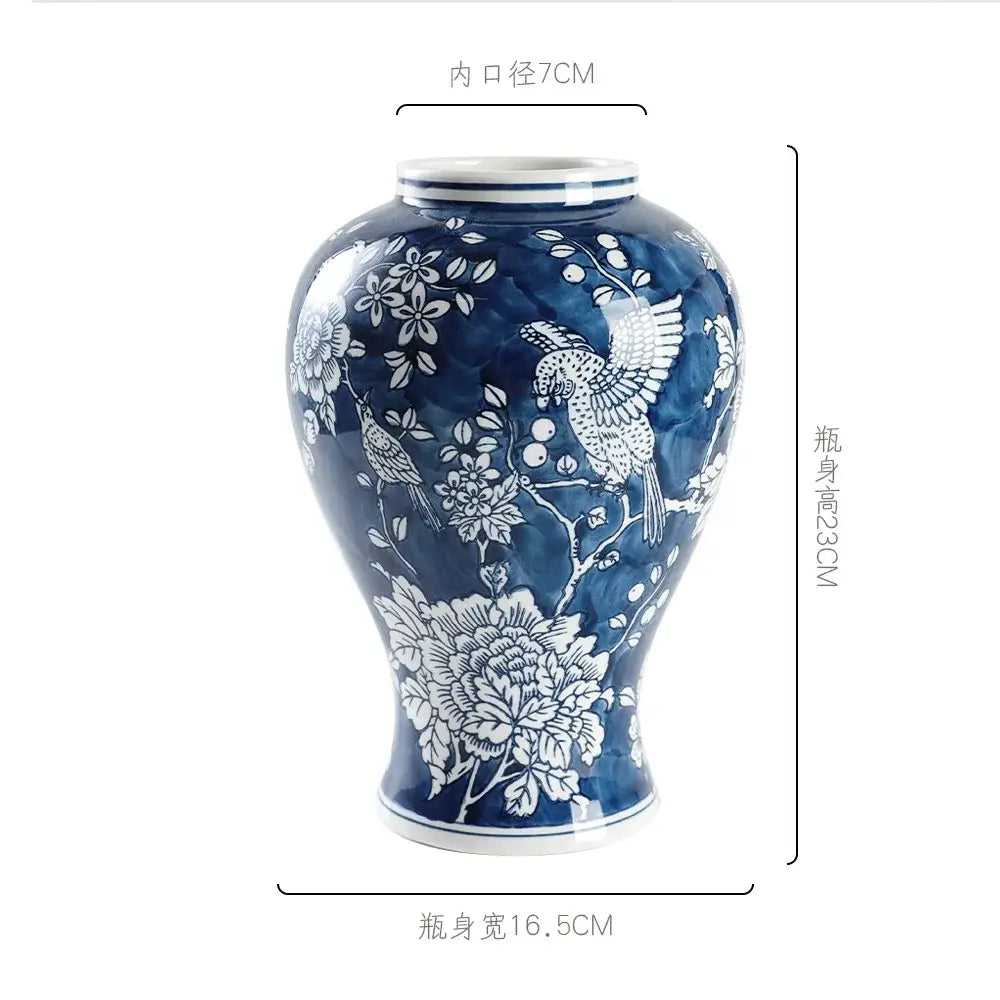 Retro blue white porcelain vase featuring intricate hand-painted birds and blossoms for living room decorbites blue white