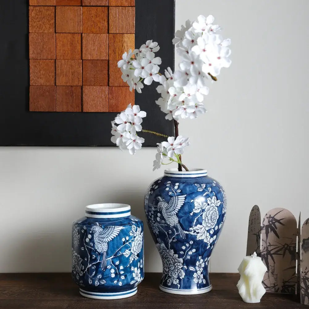 Retro blue white porcelain vase with intricate bird and floral design glossy finish ideal for living room decorbites decor